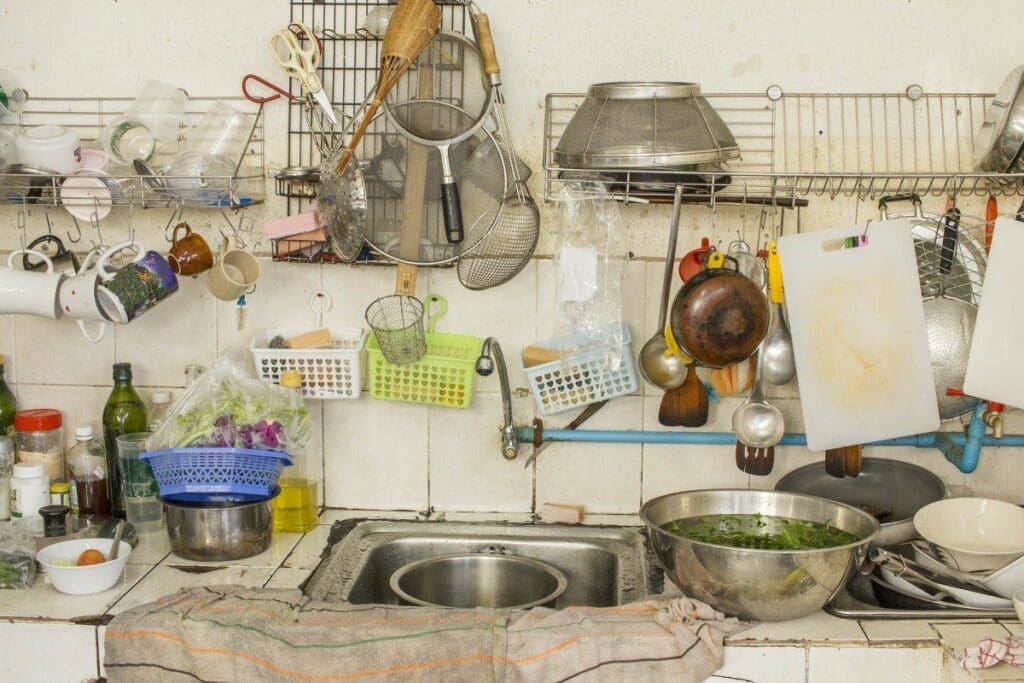 a messy kitchen in picture