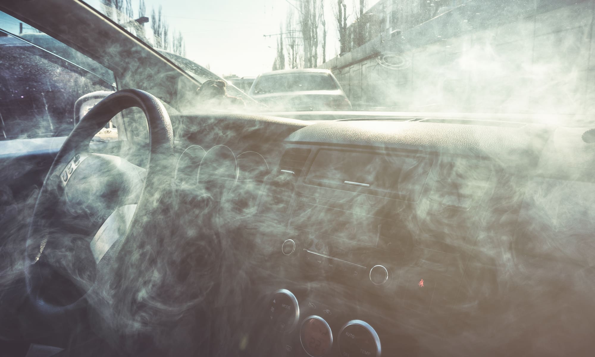 a cloud of smoke in the car.
